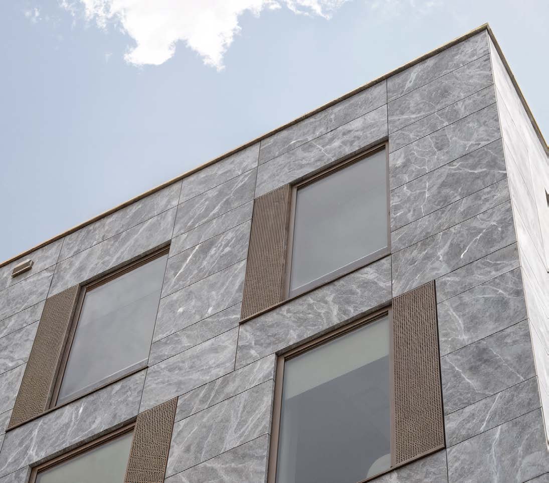 CLADLITE Marble-Travertine finish CL-MT-03 on a corner elevation